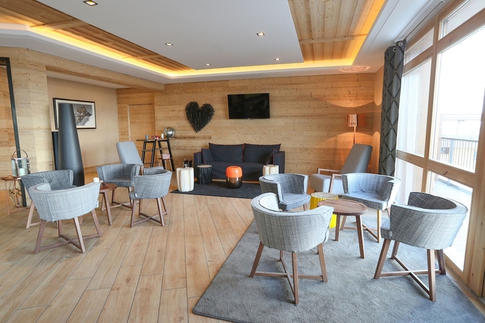 Imagen de los interiores del Hotel Residence Club Mmv Le Coeur Des Loges. Foto 17