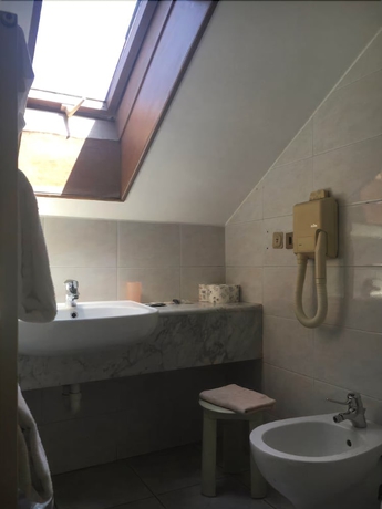Imagen de la habitación del Hotel Residence D'azeglio. Foto 11