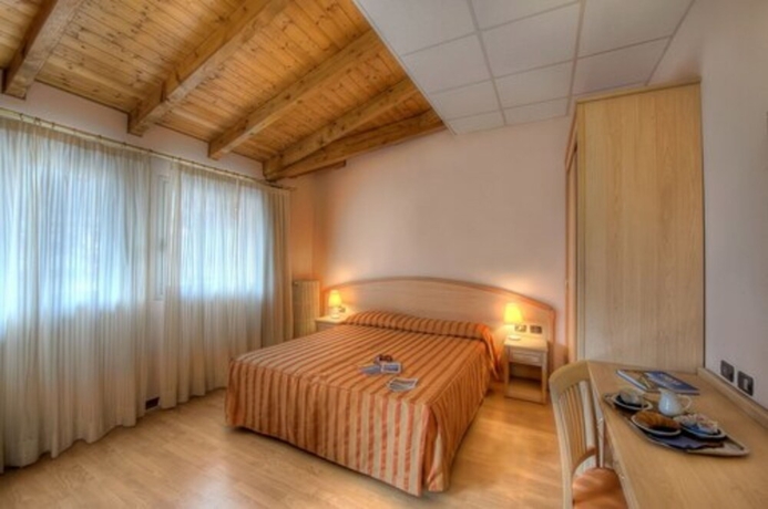 Imagen de la habitación del Hotel Residence Dei Fiori, Romanico. Foto 5