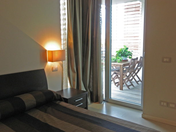 Imagen de la habitación del Hotel Residence Delfina. Foto 7