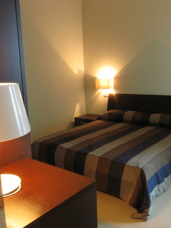 Imagen de la habitación del Hotel Residence Delfina. Foto 8
