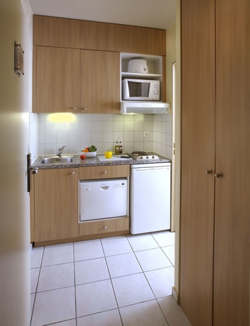 Imagen de la habitación del Hotel Residence Didot Montparnasse Paris. Foto 10