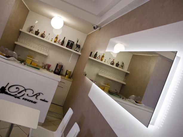 Imagen del bar/restaurante del Hotel Residence Divina. Foto 2