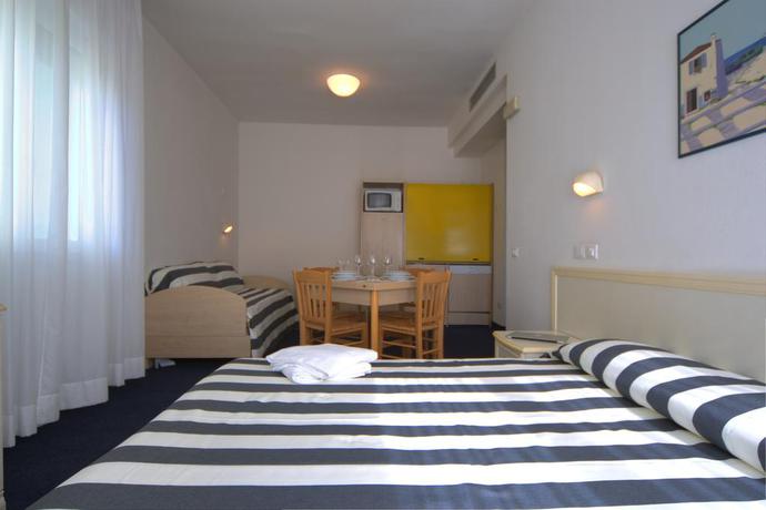 Imagen de la habitación del Hotel Residence Divina. Foto 8