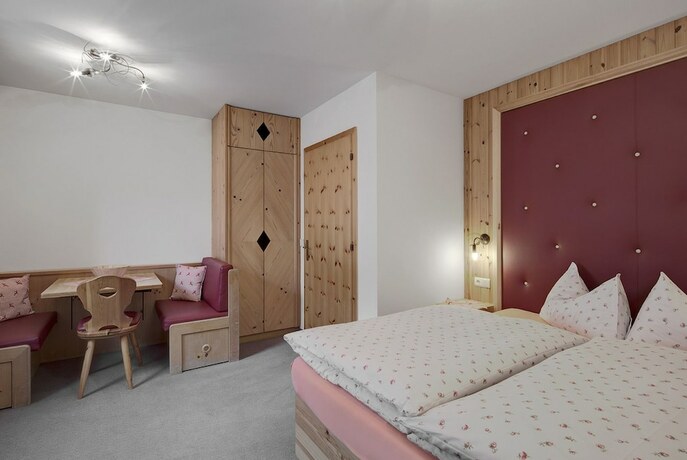 Imagen de la habitación del Hotel Residence Dolomieu. Foto 18