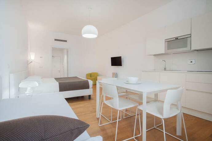 Imagen de la habitación del Hotel Residence Grandi Magazzini. Foto 19