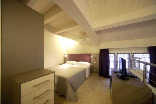 Imagen de la habitación del Hotel Residence Hotel Le Viole. Foto 11