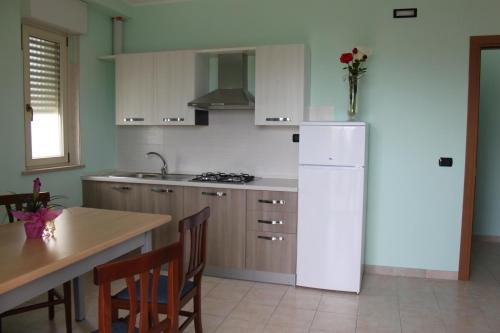 Imagen de la habitación del Hotel Residence Il Triangolo. Foto 18