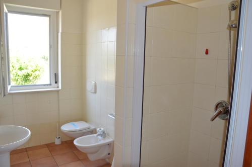 Imagen de la habitación del Hotel Residence Il Triangolo. Foto 19