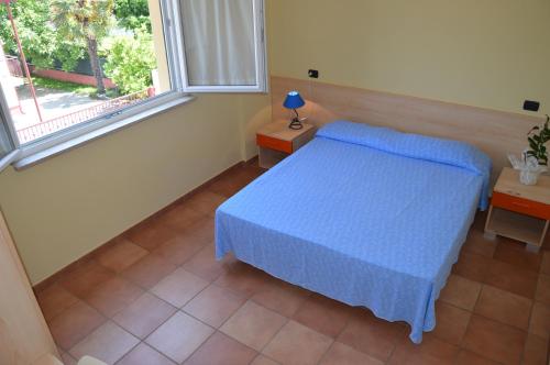 Imagen de la habitación del Hotel Residence Il Triangolo. Foto 20
