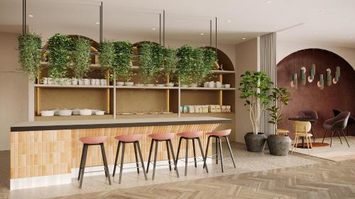 Imagen del bar/restaurante del Hotel Residence Inn By Marriott Geneva City Nations. Foto 14