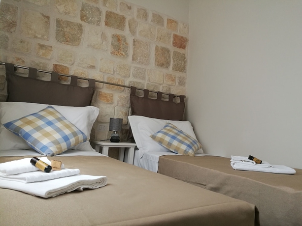 Imagen de la habitación del Hotel Residence La Corvetta. Foto 11