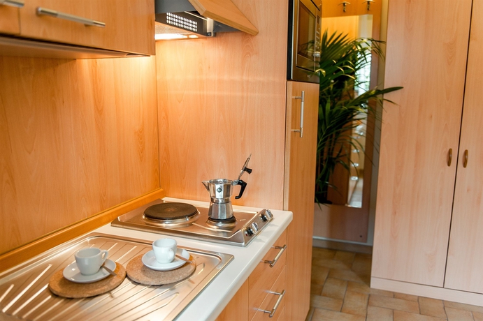 Imagen de la habitación del Hotel Residence La Genziana. Foto 10