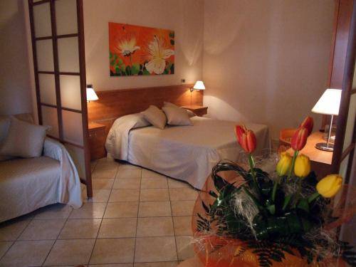 Imagen de la habitación del Hotel Residence La Giara. Foto 6