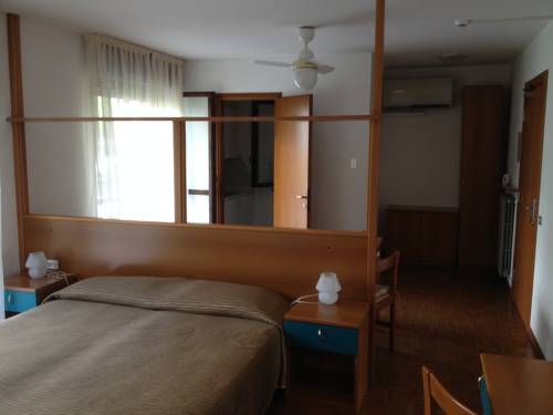 Imagen de la habitación del Hotel Residence La Porta Del Cuore. Foto 6
