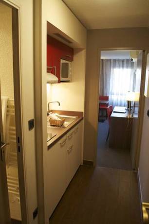 Imagen de la habitación del Hotel Residence La Reserve. Foto 10