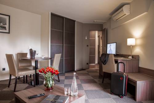 Imagen de la habitación del Hotel Residence La Reserve. Foto 16