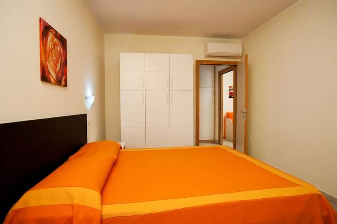 Imagen de la habitación del Hotel Residence La Rosa Dei Venti. Foto 17