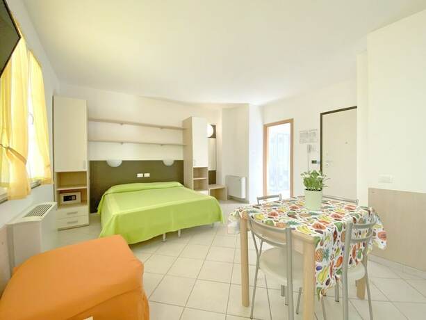 Imagen de la habitación del Hotel Residence La Rosa Dei Venti. Foto 18