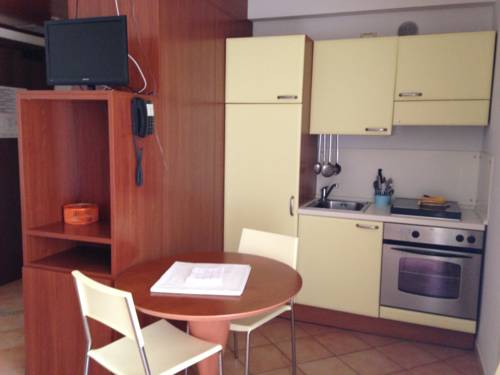 Imagen de la habitación del Hotel Residence Le Saline. Foto 7