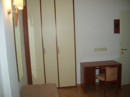 Imagen de la habitación del Hotel Residence Le Saline. Foto 15