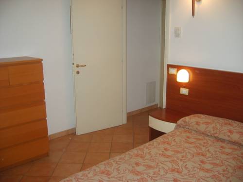 Imagen de la habitación del Hotel Residence Le Saline. Foto 16