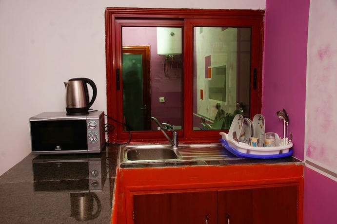 Imagen de la habitación del Hotel Residence Loulou. Foto 10