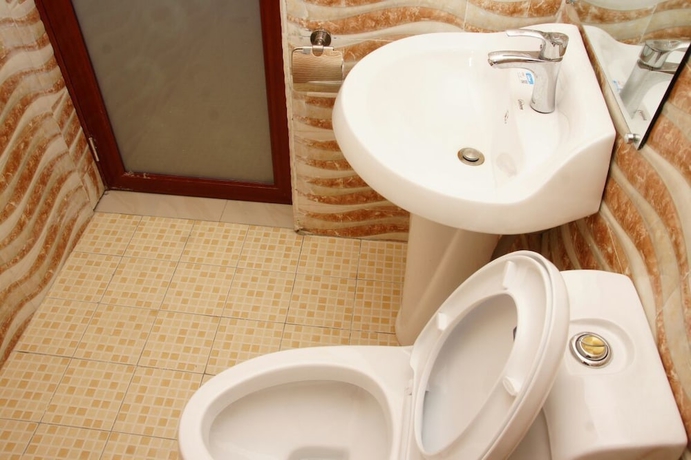 Imagen de la habitación del Hotel Residence Loulou. Foto 16