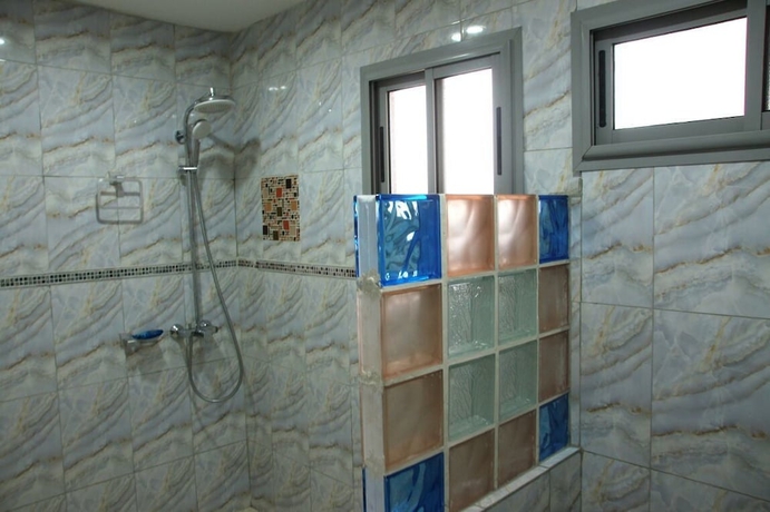 Imagen de la habitación del Hotel Residence Loulou. Foto 18