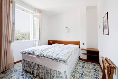 Imagen de la habitación del Hotel Residence L'ulivo. Foto 7