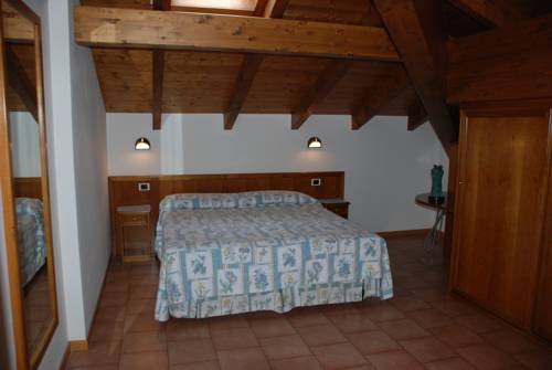 Imagen de la habitación del Hotel Residence L'ulivo. Foto 14