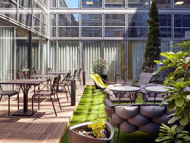 Imagen de los interiores del Hotel Residence Mercure Paris La Defense Grande Arche. Foto 17