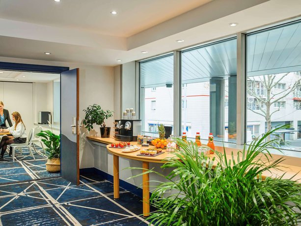 Imagen de los interiores del Hotel Residence Mercure Paris La Defense Grande Arche. Foto 20