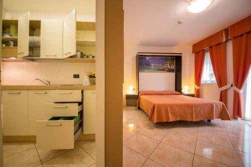 Imagen de la habitación del Hotel Residence Miralago, Pissol. Foto 14