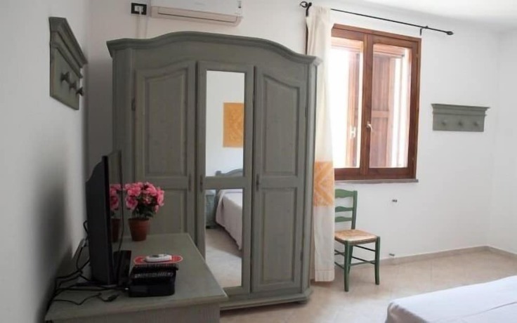 Imagen de la habitación del Hotel Residence Monte Ricciu. Foto 5