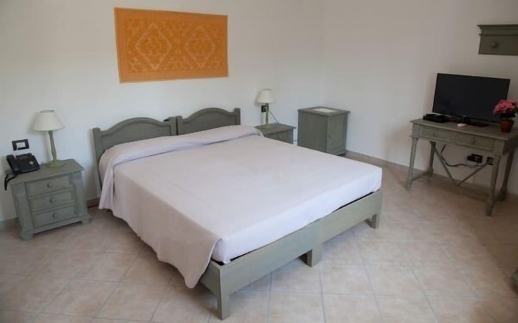 Imagen de la habitación del Hotel Residence Monte Ricciu. Foto 8