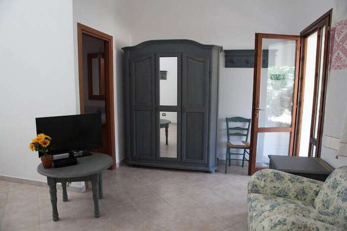 Imagen de la habitación del Hotel Residence Monte Ricciu. Foto 9