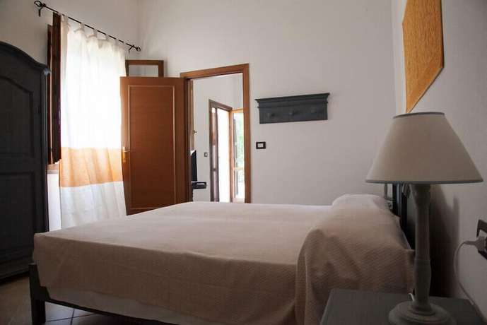 Imagen de la habitación del Hotel Residence Monte Ricciu. Foto 12