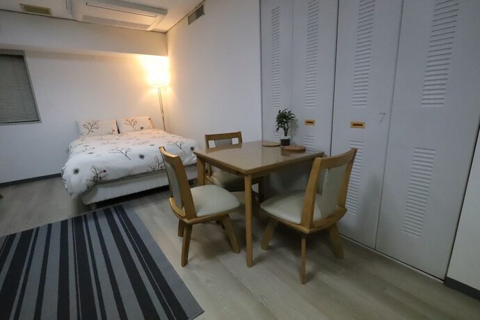 Imagen de la habitación del Hotel Residence Osaka Nipponbashi. Foto 28