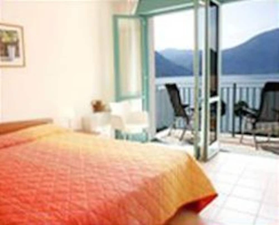 Imagen de la habitación del Hotel Residence Porto Letizia. Foto 5