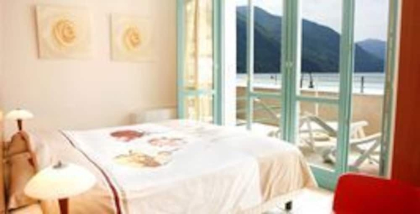 Imagen de la habitación del Hotel Residence Porto Letizia. Foto 7