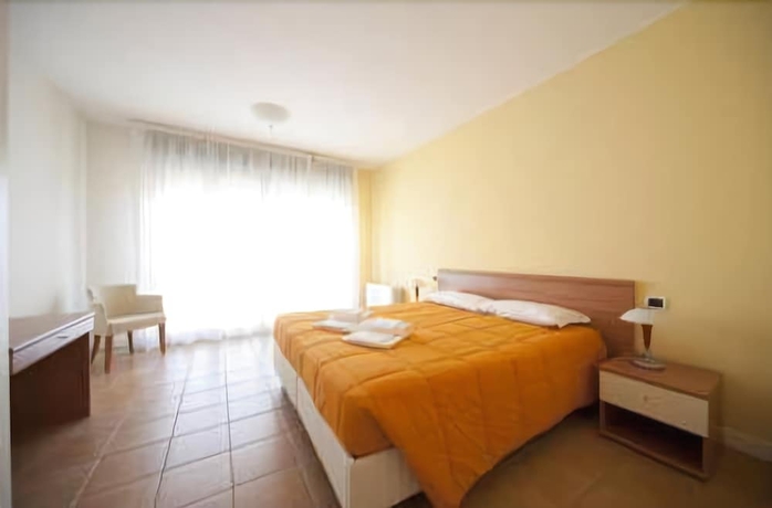 Imagen de la habitación del Hotel Residence Porto Letizia. Foto 8