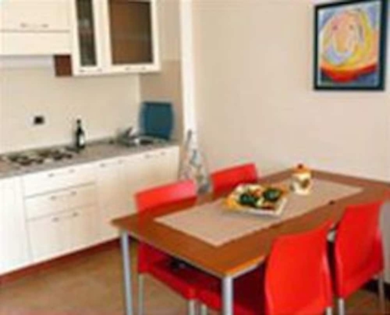 Imagen de la habitación del Hotel Residence Porto Letizia. Foto 9