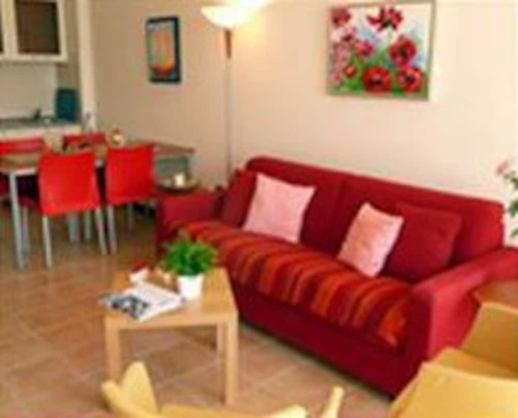 Imagen de la habitación del Hotel Residence Porto Letizia. Foto 11