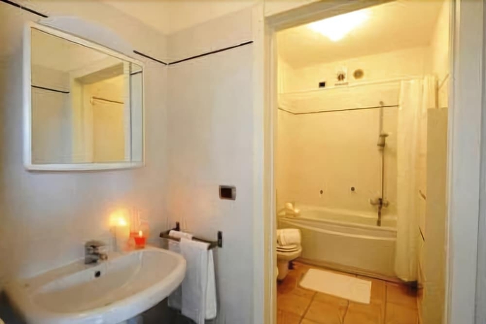 Imagen de la habitación del Hotel Residence Porto Letizia. Foto 14