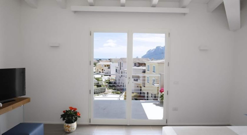 Imagen de la habitación del Hotel Residence Porto San Paolo. Foto 5