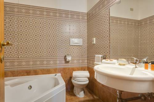 Imagen de la habitación del Hotel Residence San Gregorio. Foto 14