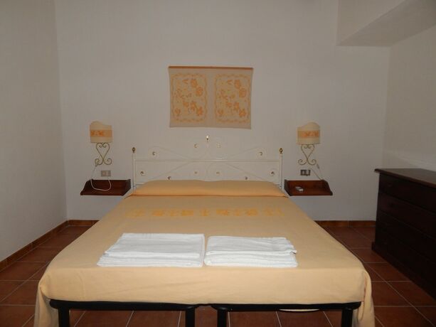 Imagen de la habitación del Hotel Residence Spiaggia Bianca. Foto 13