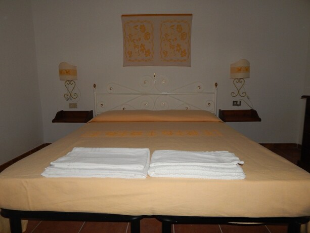 Imagen de la habitación del Hotel Residence Spiaggia Bianca. Foto 15