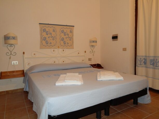 Imagen de la habitación del Hotel Residence Spiaggia Bianca. Foto 16
